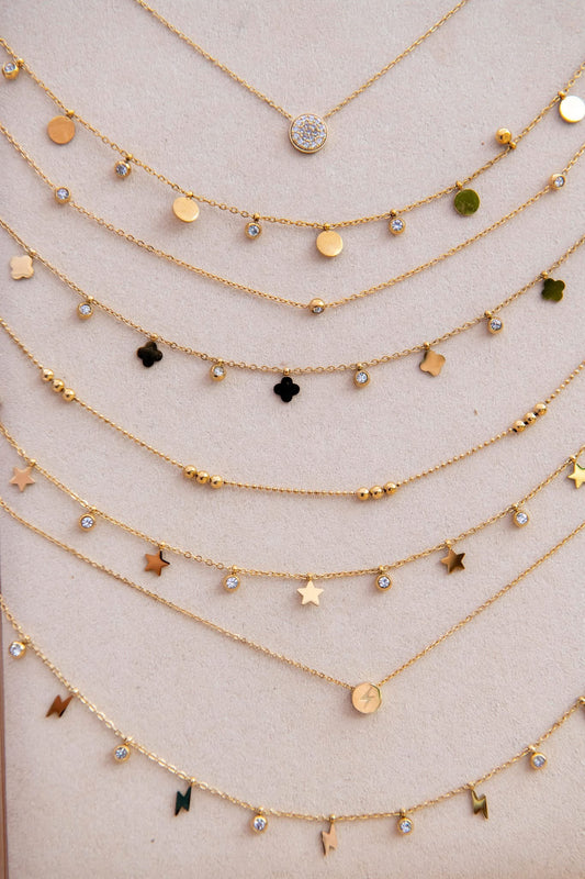 Disc's and diamante necklace